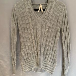 Woman’s knitted pullover sweater